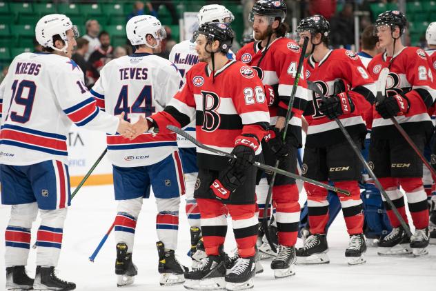 Belleville Senators shake hands with the Rochester Americans