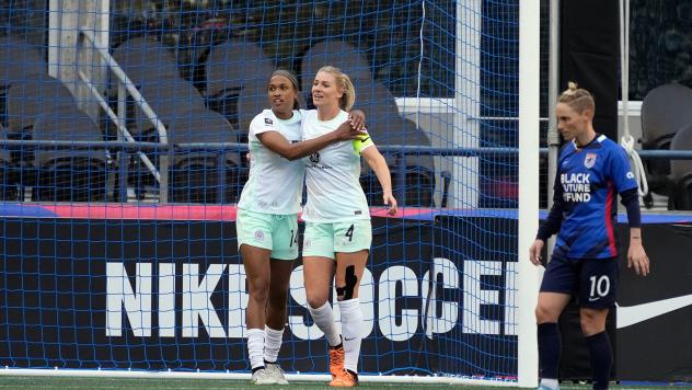 Racing Louisville FC forward Jess McDonald (left) and defender Gemma Bonner