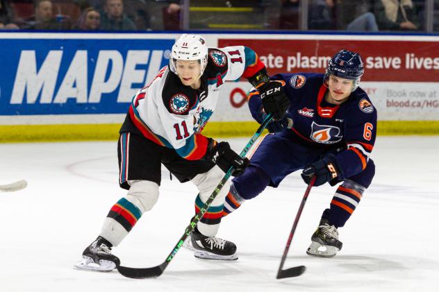 Kelowna Rockets forward Pavel Novak (left)