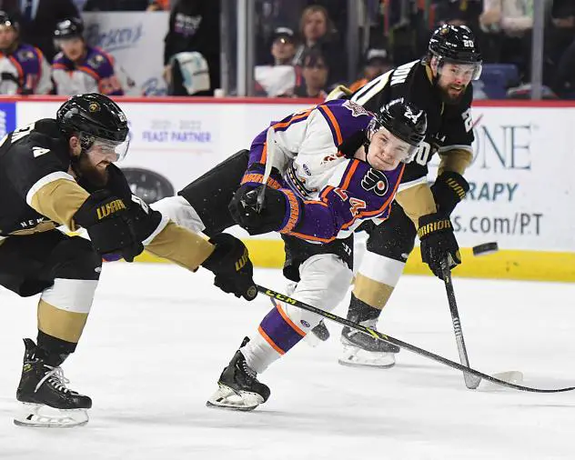 Reading Royals defenseman Mason Millman (center)