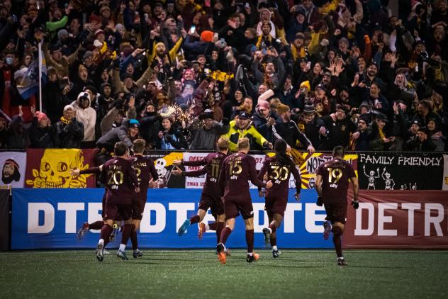 Detroit City FC celebrates a goal with the home fans