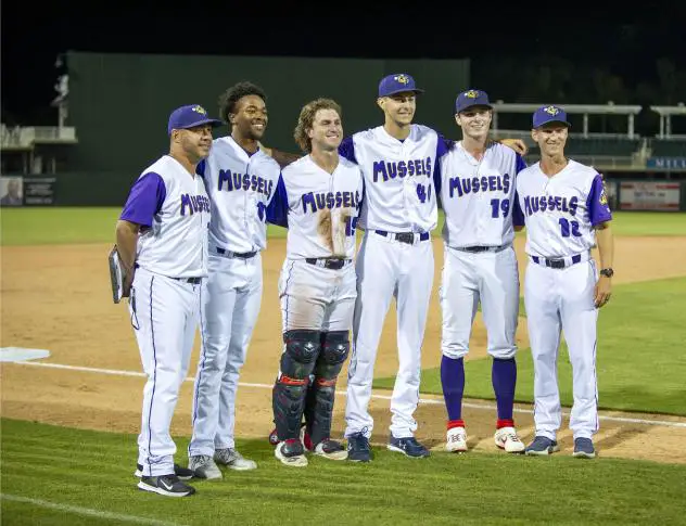 Fort Myers Mighty Mussels pitchers and staff celebrate the team's no-hitter