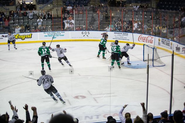 Rapid City Rush react after a goal against the Utah Grizzlies