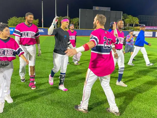 Victor Victor Mesa and the Pensacola Blue Wahoos celebrate a walk-off win