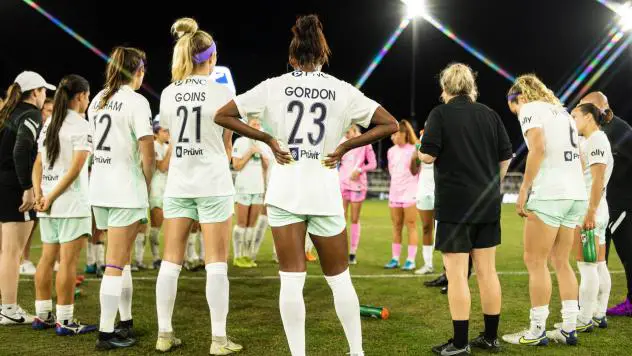 Racing Louisville FC huddle