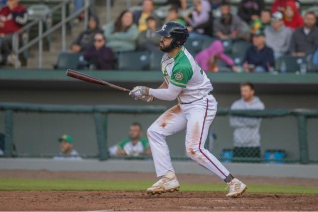 Willie Abreu of the Kansas City Monarchs drives in one of his three RBI on the night