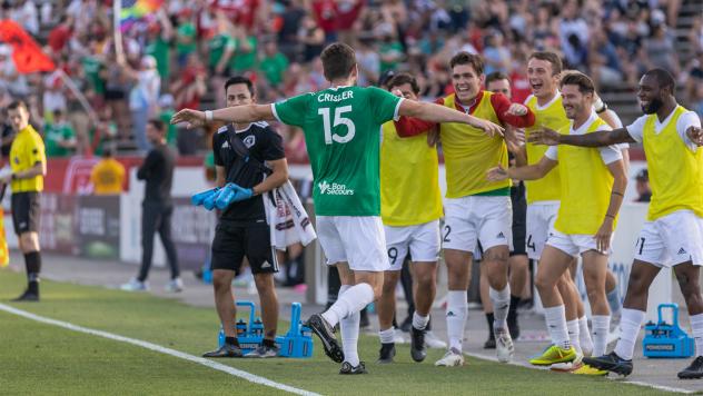 Jalen Crisler of the Richmond Kickers is greeted by teammates