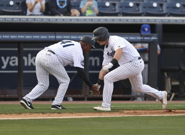 Tampa Tarpons exchange low fives