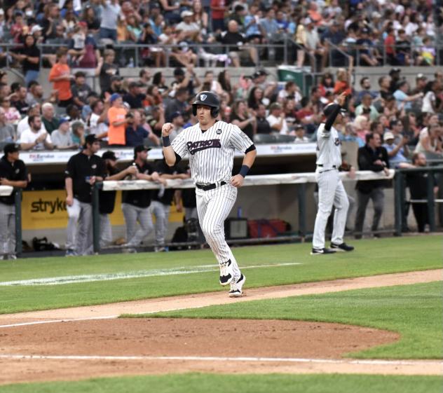 Oliver Dunn of the Somerset Patriots heads home