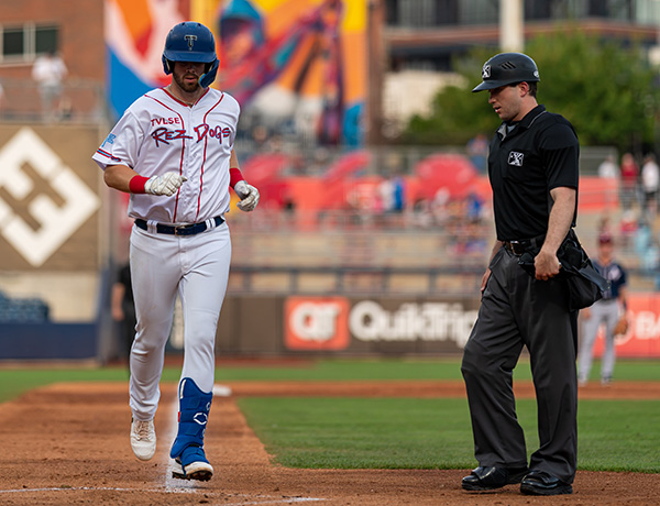 Brandon Lewis of the Tulsa Drillers trots home