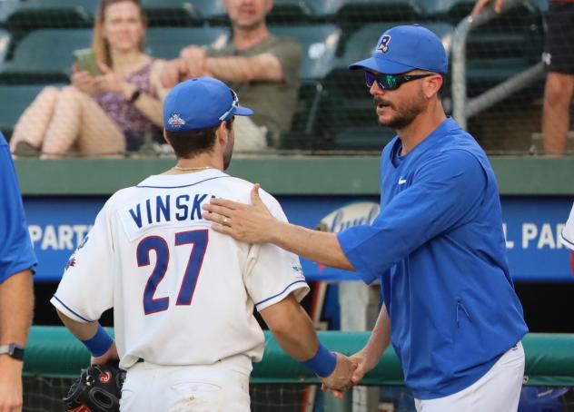 David Vinsky of the New York Boulders is congratulated by Manager TJ Stanton