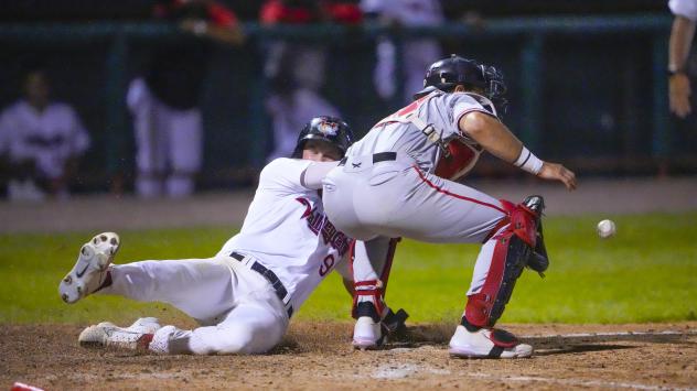 Tri-City ValleyCats infielder Brantley Bell slides home against the New Jersey Jackals