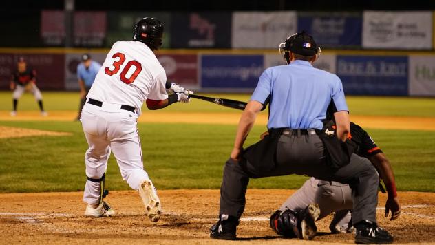 Tri-City ValleyCats infielder Juan Santana takes a swing