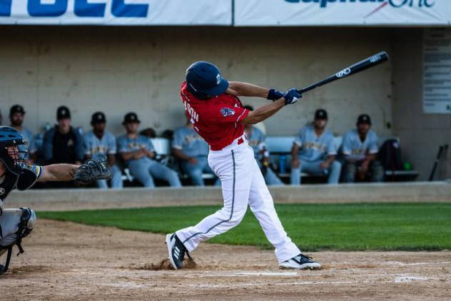 Ryan Jackson of the St. Cloud Rox takes a big swing