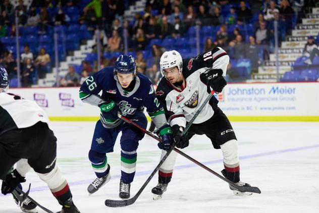 Vancouver Giants centre Colton Langkow (right) vs. the Seattle Thunderbirds