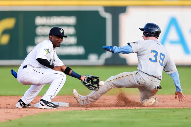 Omar Florentino of the Columbia Fireflies applies the tag vs. the Charleston RiverDogs