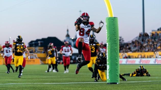 Calgary Stampeders wide receiver Reggie Begelton scores against the Hamilton Tiger-Cats