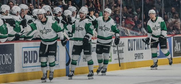 Texas Stars offer congratulations along the bench