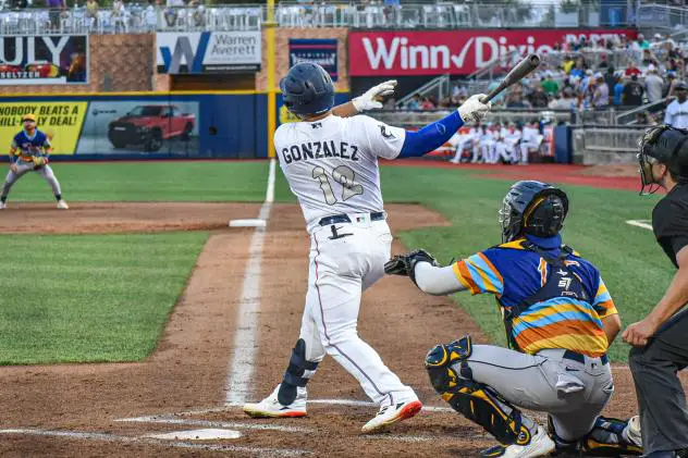 Norel González of the Pensacola Blue Wahoos gets ahold of a pitch