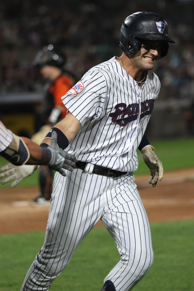 Max Burt of the Somerset Patriots circles the bases following his home run
