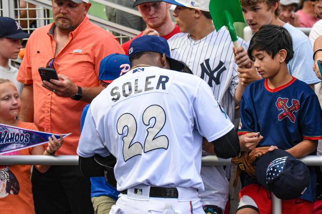 Jorge Soler of the Pensacola Blue Wahoos signs autographs