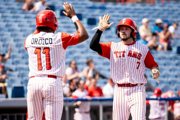 Ottawa Titans' Rodrigo Orozco and AJ Wright Slap Hands