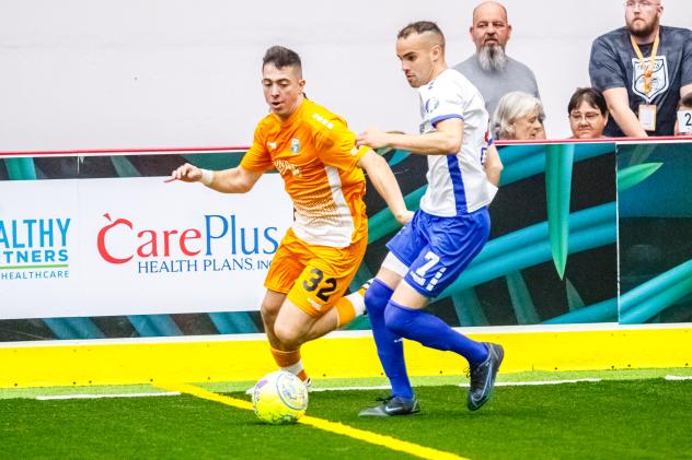 Breno Oliveria of the Florida Tropics (left)