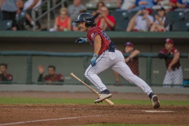 Jacob Robson of the Kansas City Monarchs knocks a single