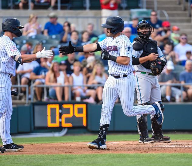 Austin Wells of the Somerset Patriots rounds the bases