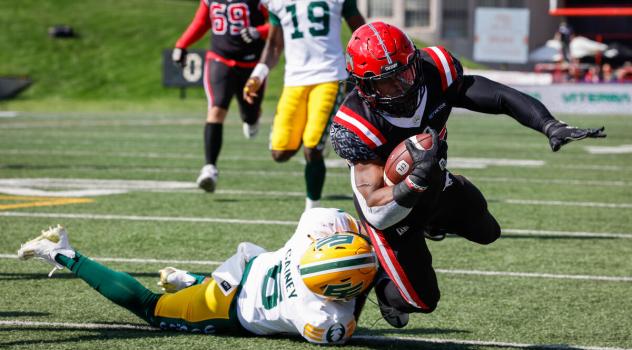Calgary Stampeders battle the Edmonton Elks