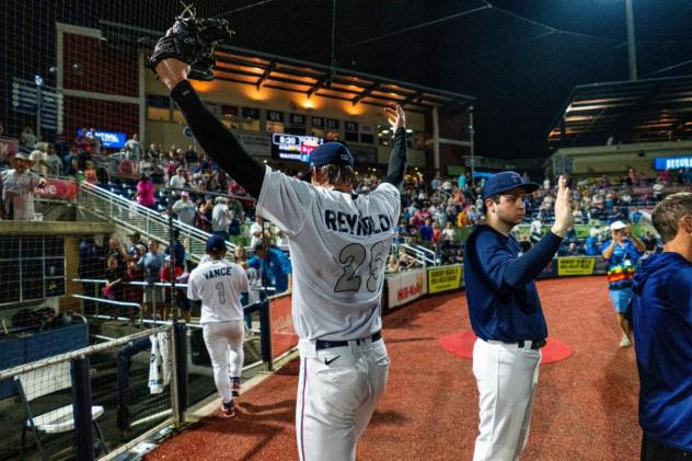 Pensacola Blue Wahoos pitcher Sean Reynolds celebrates a comeback win