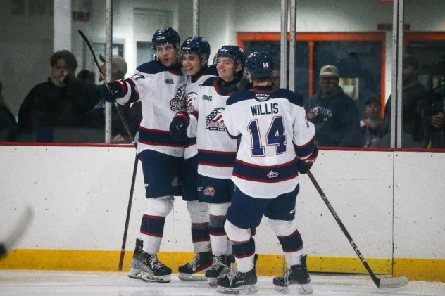 Saginaw Spirit react after a goal