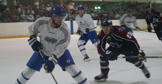 Tulsa Oilers' Connor Bramwell takes on the Wichita Thunder