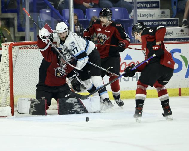 Vancouver Giants goaltender Jesper Vikman battles  the Winnipeg ICE