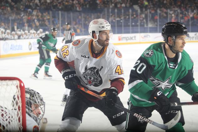 Texas Stars center Tanner Kero (right) vs. the Chicago Wolves