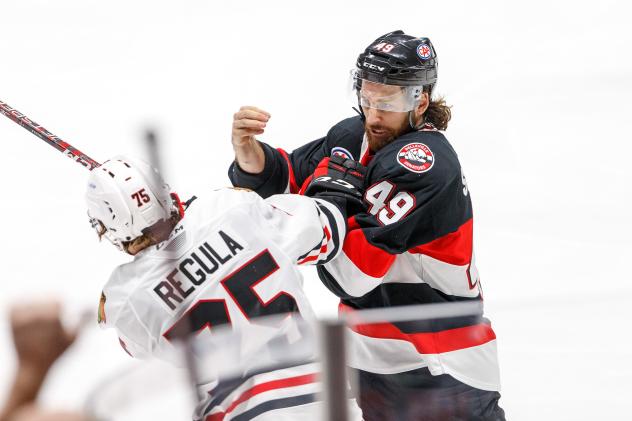 Belleville Senators' Scott Sabourin battles Rockford IceHogs' Alec Regula