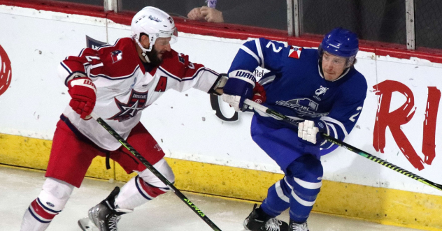 Wichita Thunder forward Michal Stinil (right) vs. the Allen Americans