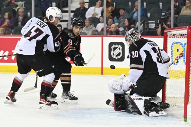 Vancouver Giants goaltender Jesper Vikman eyes a shot by the Calgary Hitmen
