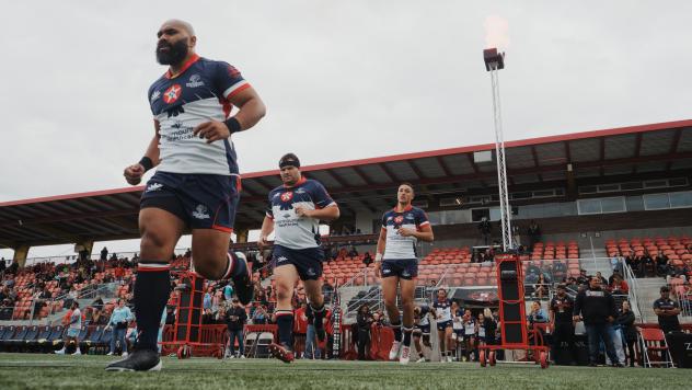 Utah Warriors enter the field