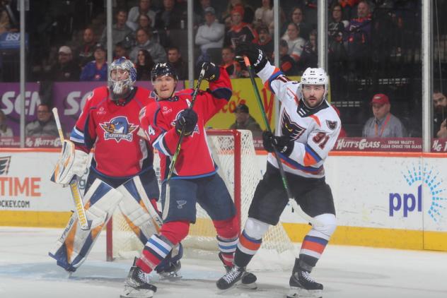 Springfield Thunderbirds' Steven Santini battles Lehigh Valley Phantoms' Elliot Desnoyers