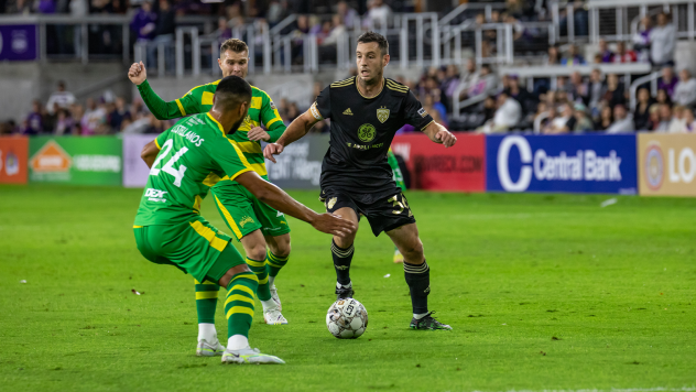 Louisville City FC midfielder Paolo DelPiccolo with possession vs. the Tampa Bay Rowdies
