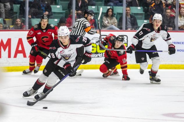 Vancouver Giants' Julian Cull and Matthew Edwards in action