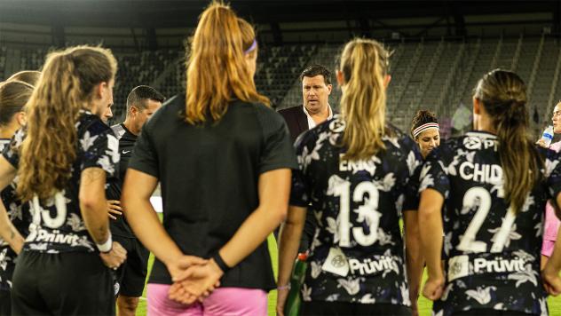 Racing Louisville FC huddle
