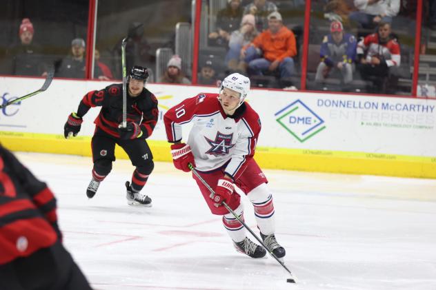 Allen Americans' Jackson Leppard and Cincinnati Cyclones' Matt Berryon the ice