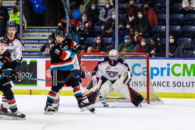 Kelowna Rockets left wing Turner McMillan in front of the Tri-City Americans' goal