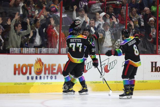 Cincinnati Cyclones' Dakota Betts, Lincoln Griffin and Zack Andrusiak celebrate win