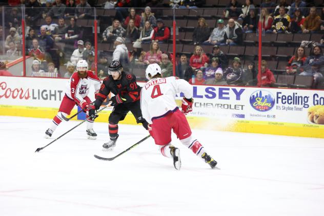 Allen Americans' Kris Myllari and Colton Saucerman battle Cincinnati Cyclones' Mathew Berry