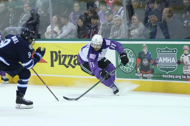 Texas Stars' Riley Barber battles Manitoba Moose' Leon Gawanke