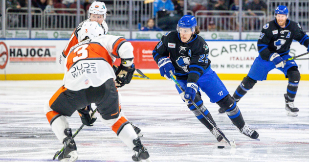 Wichita Thunder forward Brayden Watts handles the puck against the Kansas City Mavericks