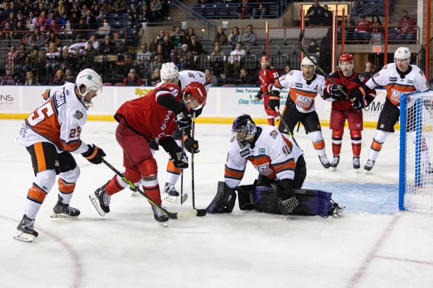 Rapid City Rush's Ryan Zuhlsdorf battles Kansas City Mavericks' Shane Starrett